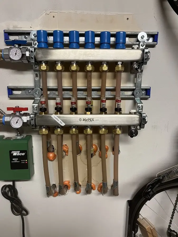 Plumber performing Water Heater Repair at a residential property in North Miami